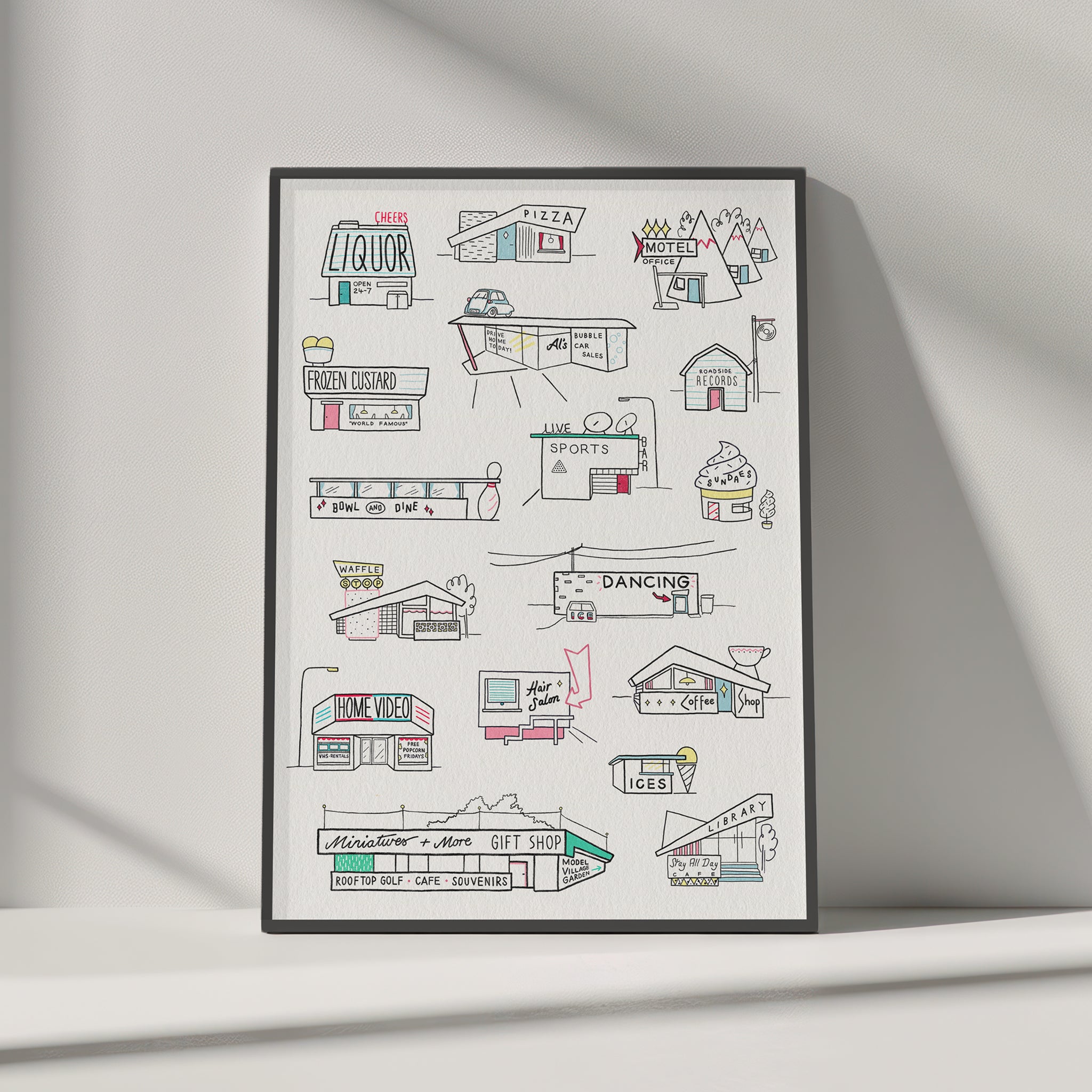 An art print featuring hand-drawn retro-style illustrations of various diner and fast-food establishments that you might see on a US road trip, displayed against a neutral light grey wall.